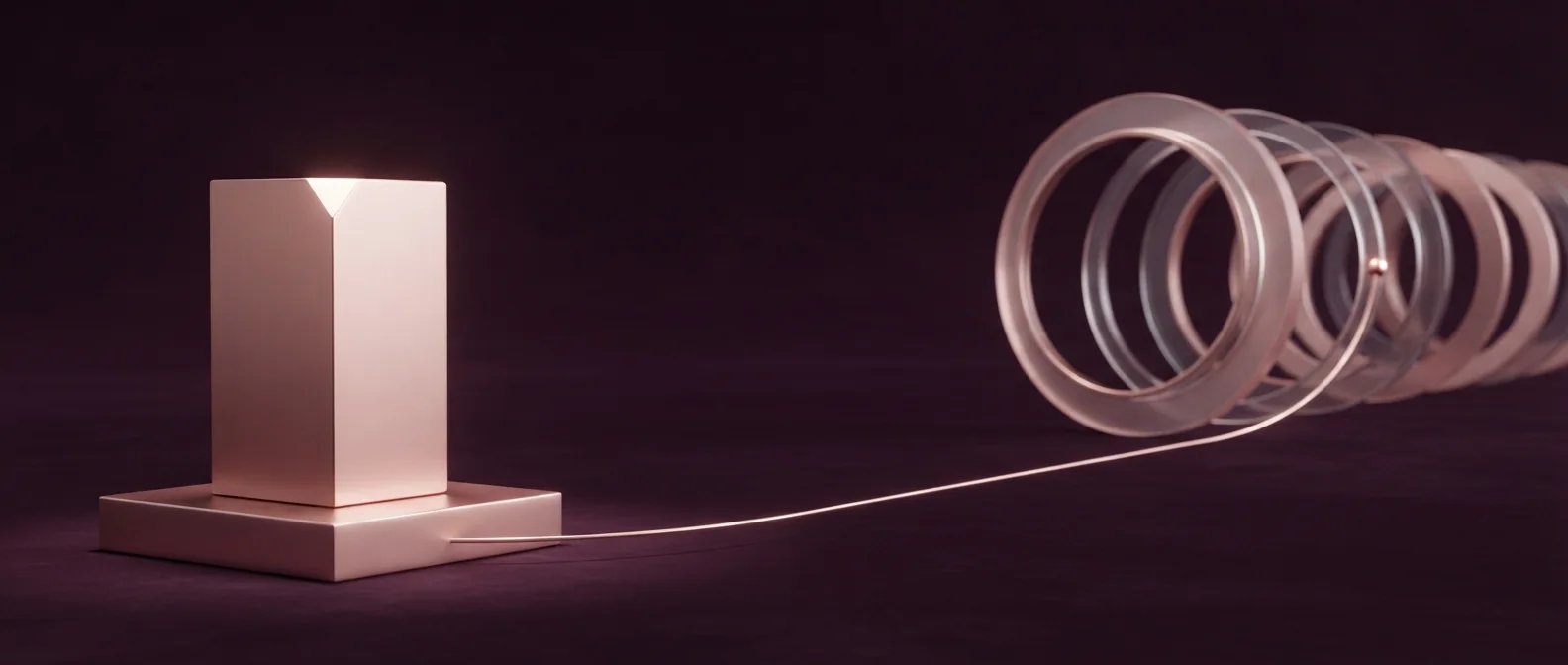 A single solid block beside a repeating series of rings, joined by a rising line